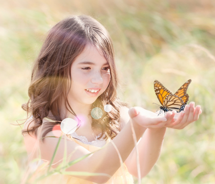 Young girl taking part in an Oklahoma butterfly release.